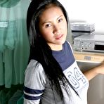 First pic of Asian girlfriend plays with veggies in the kitchen