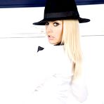 First pic of Natasha Marley wearing white shirt,hat and stockings