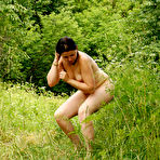 Second pic of Naked girl drinking beer at the nude beach