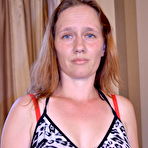 First pic of Horny mature slut playing on the couch