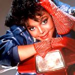 Fourth pic of Young Janet Jackson posing sexy and braless