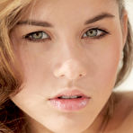 Fourth pic of Brown-haired teen babe posing