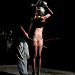 Third pic of SexPreviews - Dana Lea bound in leather and wood getting pain with pleasure