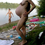 Fourth pic of Pregnant lady bathing in ocean