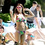 Third pic of Busty Danielle Lloyd sexy in bikini poolside