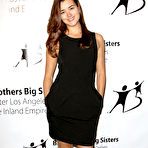 First pic of Cote de Pablo posing for paparazzi at fashion show