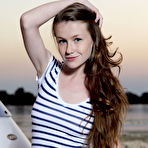 First pic of Emily Bloom  showing off her youthful assets in an outdoor shoot