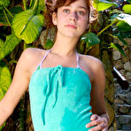 First pic of Petite nubile teen removes her bikini showing her neat little runway strip