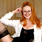 Third pic of Red mom showing her panties