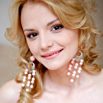 Fourth pic of Wearing a sexy pink nightwear matching lingerie, Edita Recna poses enthusiastically on the bed showcasing her slender body with glowing pale skin and spreading her sexy legs, baring her smooth, pink pussy.