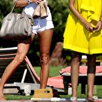 Fourth pic of Victoria Silvstedt cleavage in green bikini poolside shots in Porto Cervo