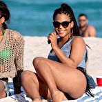 Second pic of Christina Milian sunbathing in black swimsuit