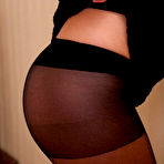 Fourth pic of CUTIESINTIGHTS - Innocent-looking blond in black nylons flashes ass