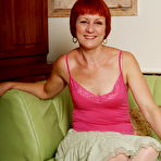 First pic of Horny mature slut playing alone on the couch