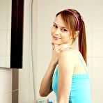 First pic of Clubseventeen Pale teen brunette showing her firm boobs