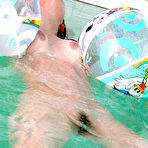 Fourth pic of beach ball girl at the pool