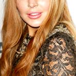 Fourth pic of Lindsay Lohan posing for paparazzi, shows her legs