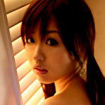 Fourth pic of Seductive asian beauty showing off her plump naked tits