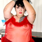 Fourth pic of Chubby Loving - Kinky BBW In Red Fishnet