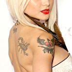 Third pic of Tila Tequila shows legs and cleavage at redcarpet paparazzi shots