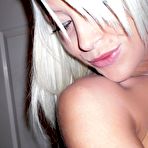 Fourth pic of Monroe Lee shows the goods in a see thru black top!