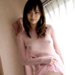 Second pic of Naughty Asian babe is a cock tease and shows her big tits