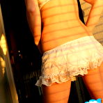 Third pic of Perky blonde babe Skye teases in a white lace bra and skirt as she strips