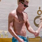 Fourth pic of Amber Heard sunbathing topless movie captures