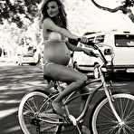 Second pic of Amanda Booth posing pregnant at home