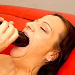 Third pic of Naughty mature slut dripping on a leather couch