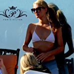 First pic of Paris Hilton hard nipples under white bikini top