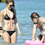 Third pic of Maria Menounos hard nipples inder black bikini