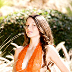 First pic of Rilee Marks takes her sexy orange dress outdoors and fingers her hungry wet meast hole. - TheMetArt.com