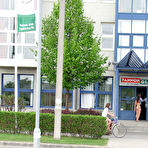 Fourth pic of Wild and attractive teen babe Orsy A strips naked in public and teases construction workers. - TheMetArt.com