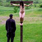 Fourth pic of SexPreviews - Siouxsie Q bound to a cross with a fire untill it gets dark