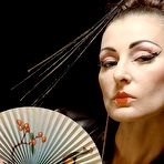 Second pic of FetishDolls.com | Bondage & Lesbian Fetish Videos, Kinky Fetish Girls, 
Kinkiest Lesbian Fantasies, featuring boot and heel worship, sexy smoking, spankings 
and nipple torment, and tons of sloppy wet strap-on sex and anal play