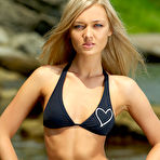 First pic of Skinny Naked Blonde Posing On A Rocky Shore