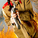 Second pic of Evelyn Lory stripping out of her Soviet army uniform