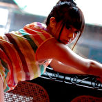 First pic of When the weather is bad, it's nice to stay indoors. Especially with a cute Japanese girl like Mina in a tiny thong next to you while playing video games.