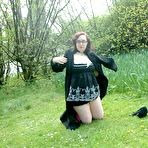 Fourth pic of Naughty Nimue exposes her horny body and masturbates on the grass