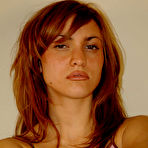 First pic of Teasing Redheaded Teen On the Bed