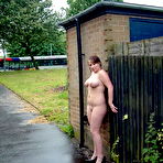 Third pic of Busty Amateur Flasher Gemma - Rainy day exhibitionism downtown