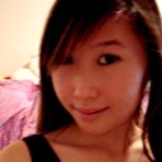 Fourth pic of Me and my asian Sexy and hot Asian babe gives great blowjob in her bedroom