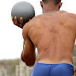Fourth pic of Black Muscle Man Working Out on The Beach