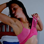 Second pic of Dark haired teen girl shows off her tiny tits