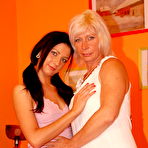 First pic of Horny blonde mature lesbian taking on a hot babe