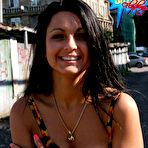 Second pic of Public flashing - Chubby flasher opens coat in a public thoroughfare