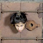 Fourth pic of With wrists, ankles, and neck shackled and chained