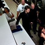 Second pic of Public Disgrace - Brunette humiliated in public sex in wash machine shop in deepthroat and anal sex romp