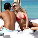 Third pic of Rita Rusic boobsliup in red bikini on the beach